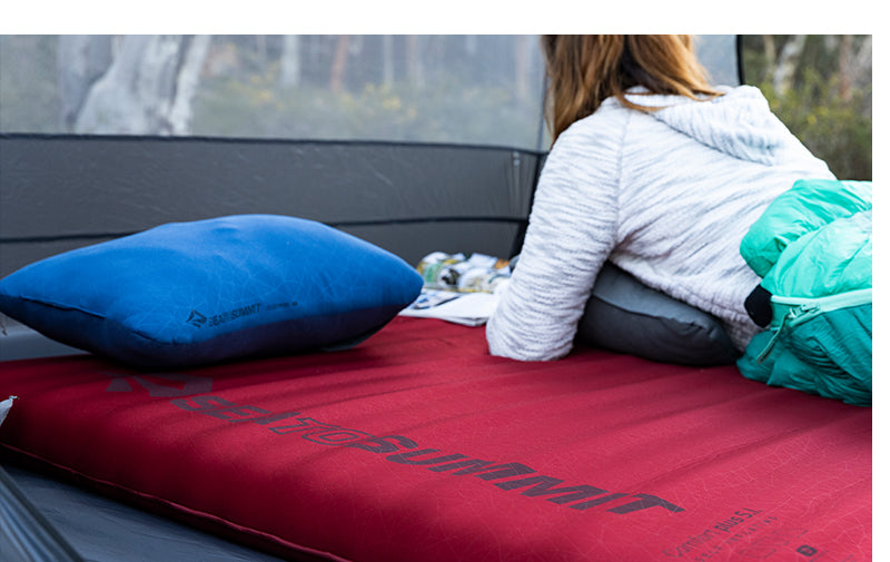 Self inflating sleeping clearance pad